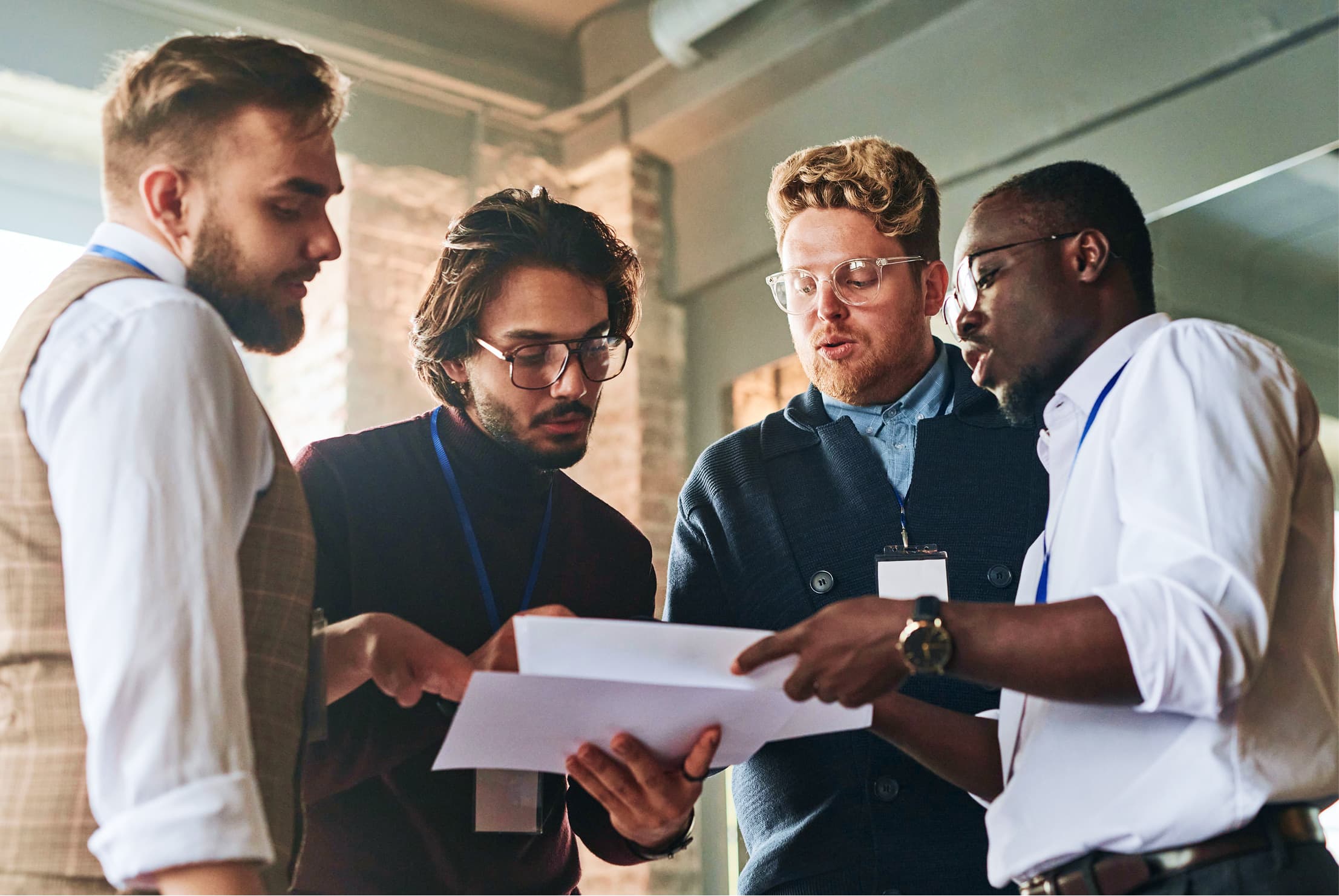 Team collaborating around a document